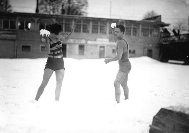 Miss E. Robinson and Pete Pantages, Royal Lifesaving Society members pose at snowy beach