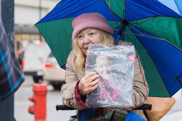 Megaphone vendor selling outdoor