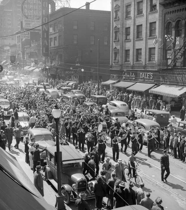 V-E Day in Vancouver. Crowds at Granville and Dunsmuir.