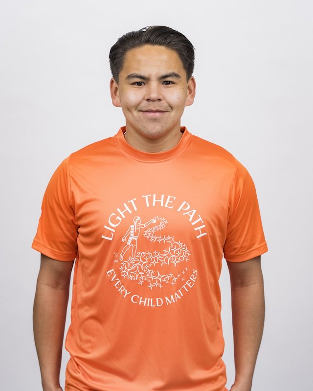 The “Light the Path” Orange Shirt designed by Debra Sparrow and grandsons Isaiah and Cyler.