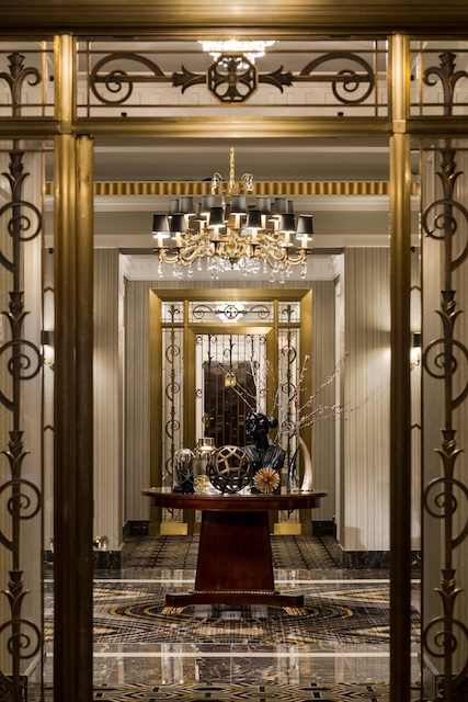 Fairmont Hotel in Vancouver's Corridor, large chandelier and ominous hallway