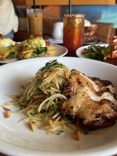 Papaya Salad with Lemongrass Chicken plated at B House for lunch