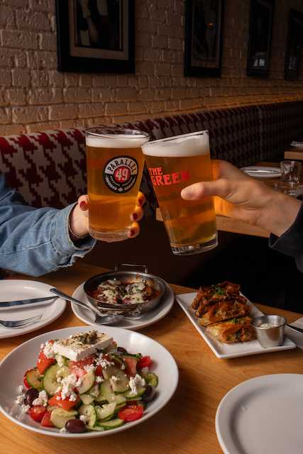 Social October cheers with beers at the Greek and with greek salad